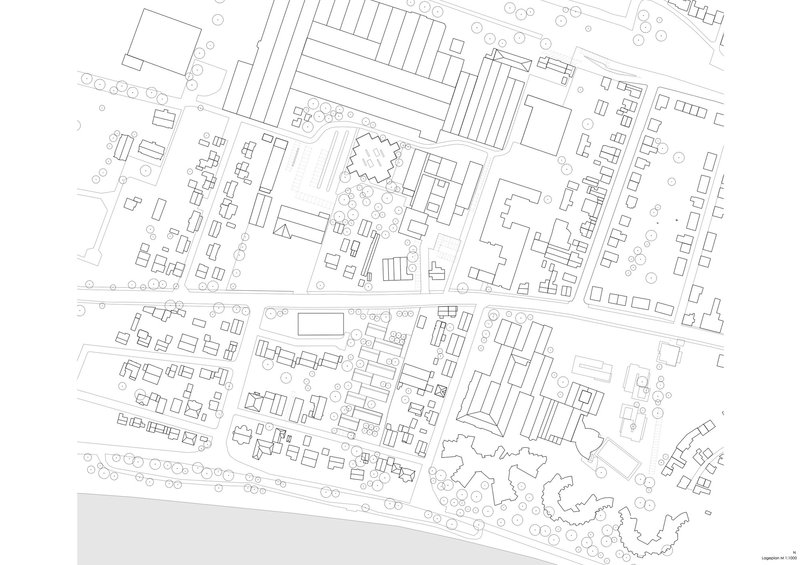Site plan drawing showing cluster of elongated buildings and curved structure amid surrounding urban fabric
