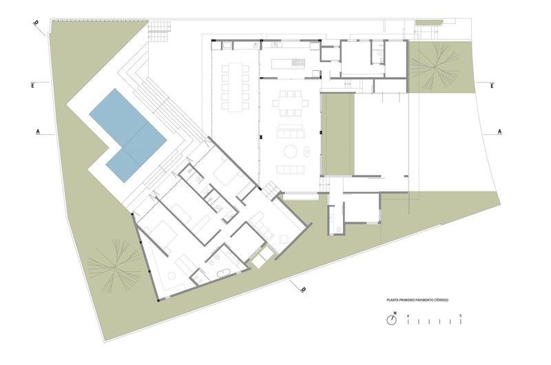 Ground floor plan drawing with pool, courtyards, and interior rooms on a triangular site