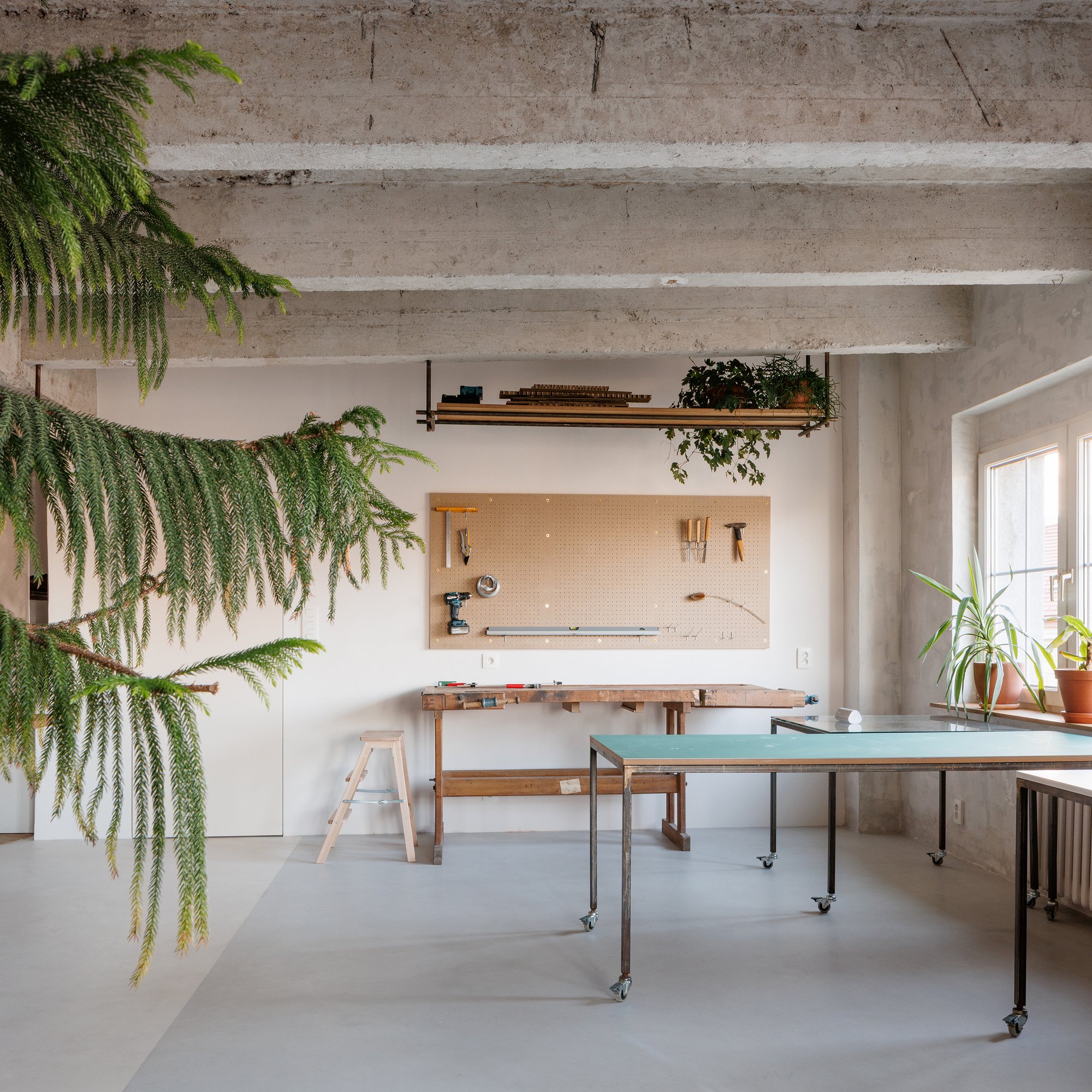 alchitekt Converts a Bratislava Apartment into a Workshop-Ready Creative Studio