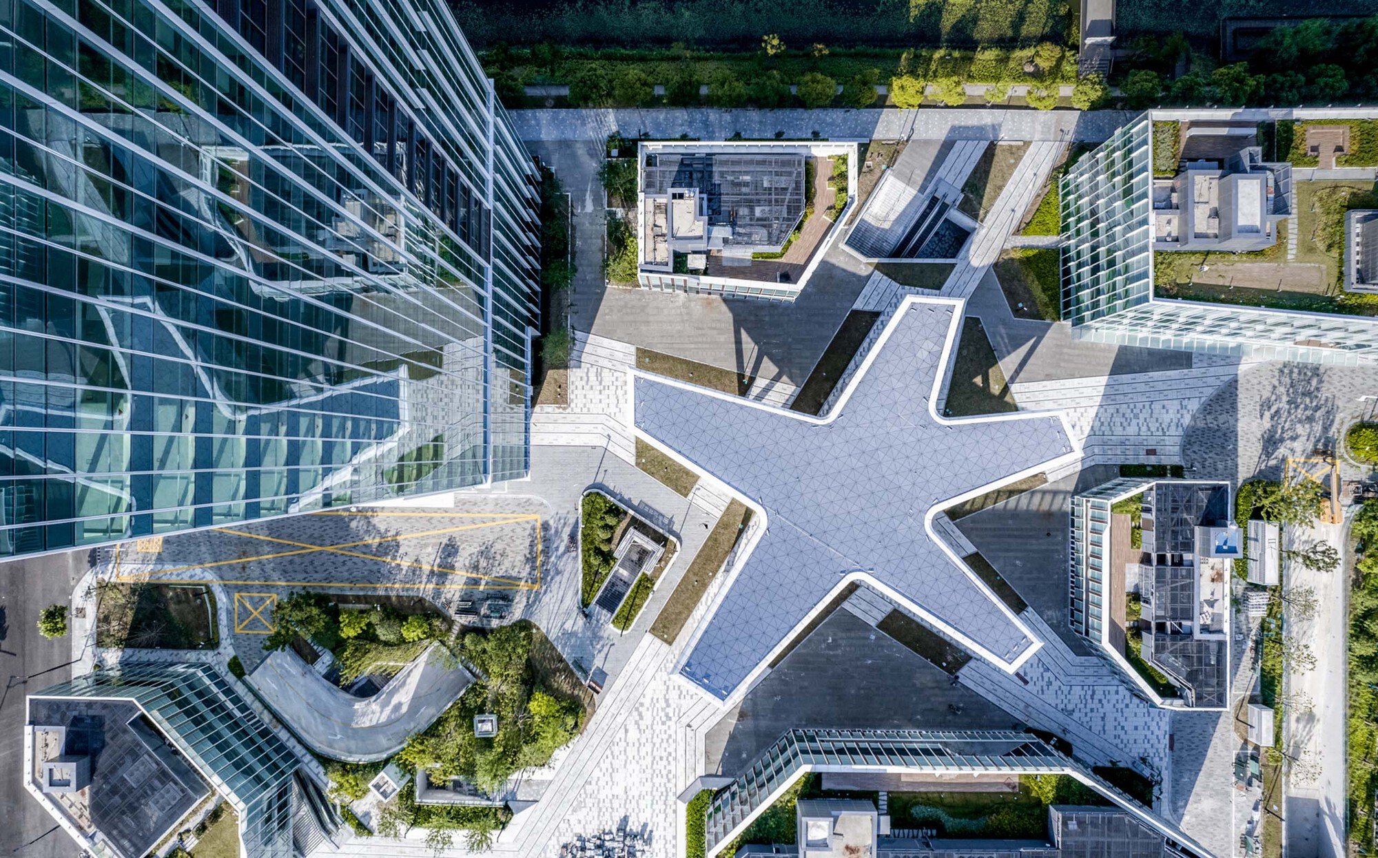 Gensler Anchors a Shanghai Riverside Campus Around a Star-Shaped Canopy