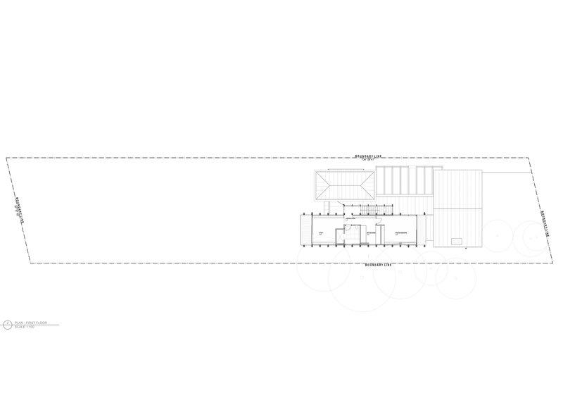 First floor plan drawing showing the upper level with deck and covered areas