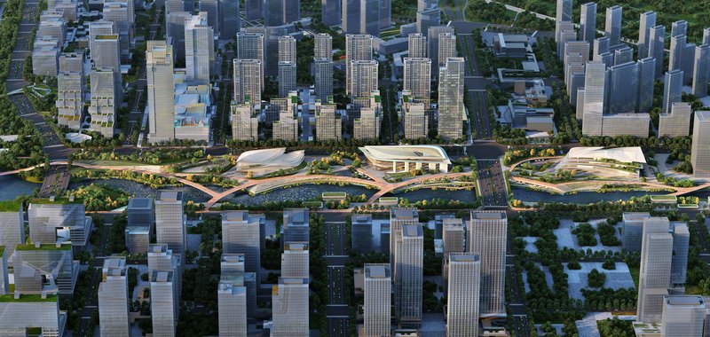 Aerial view of curved white pavilion roofs connected by elevated pedestrian bridges across a green park