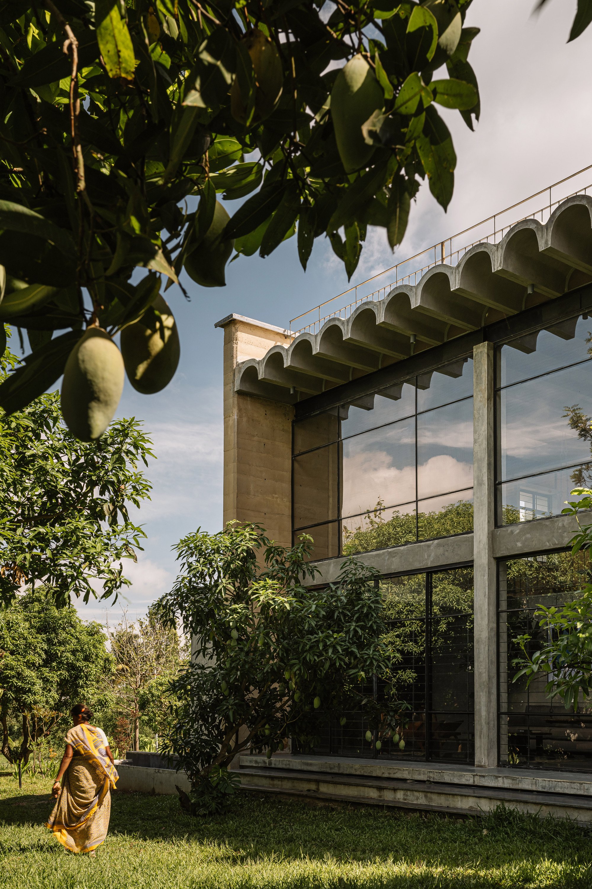 STAPATI Builds a Rammed Earth Farmhouse in Tamil Nadu That Opens Like a Matchbox