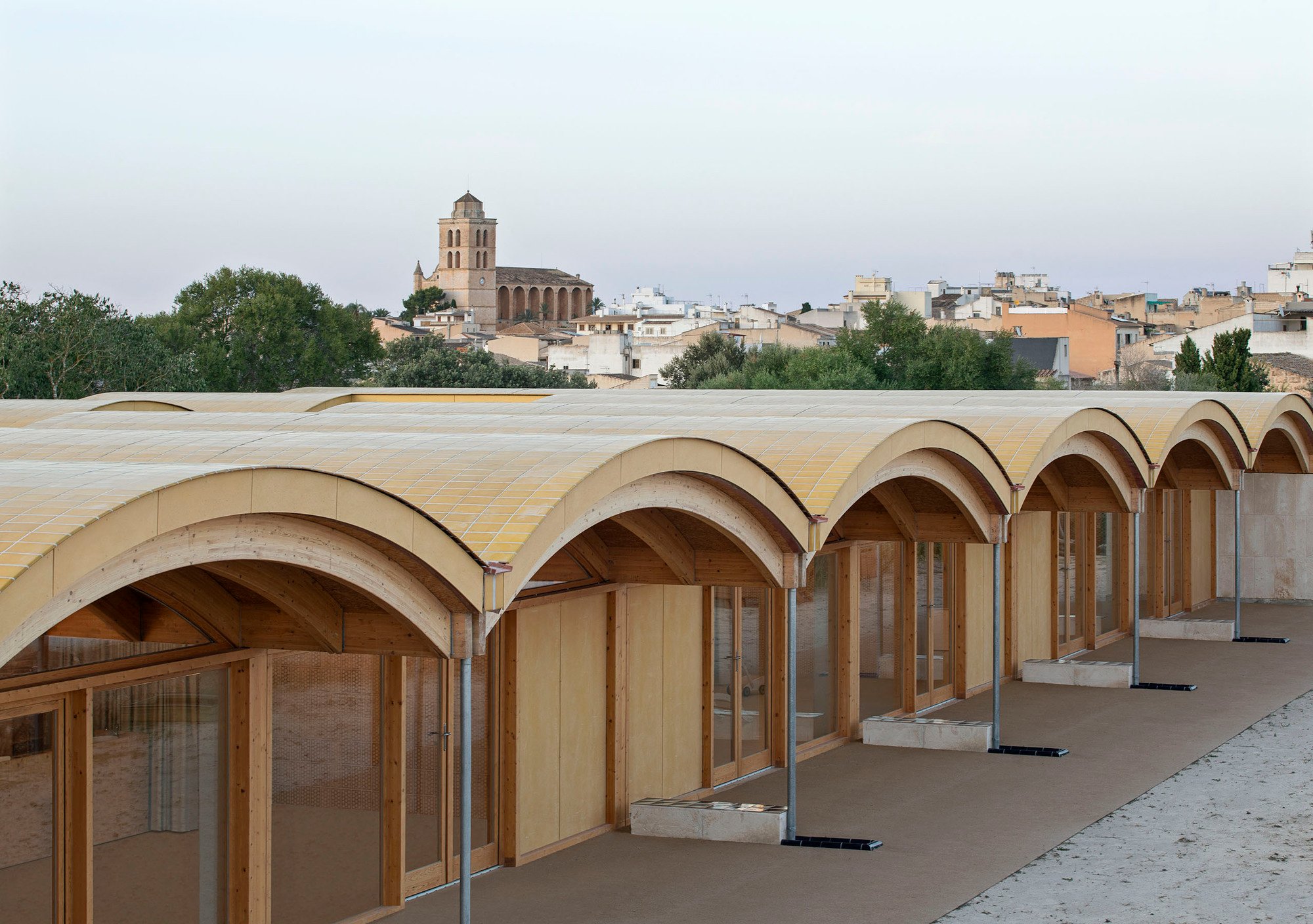 BOS Arquitectes Shelters a Mallorcan Nursery School Under Undulating Timber Vaults