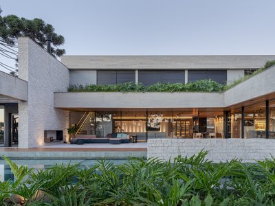 Studiocolnaghi Wraps a U-Shaped Concrete Home Around a Pool Terrace in Southern Brazil