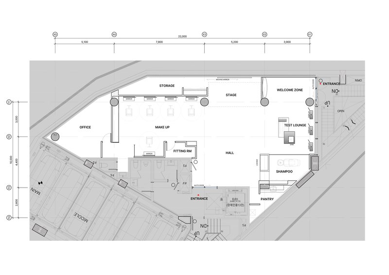Floor plan drawing showing stage and welcome zone with angled perimeter walls and labeled rooms