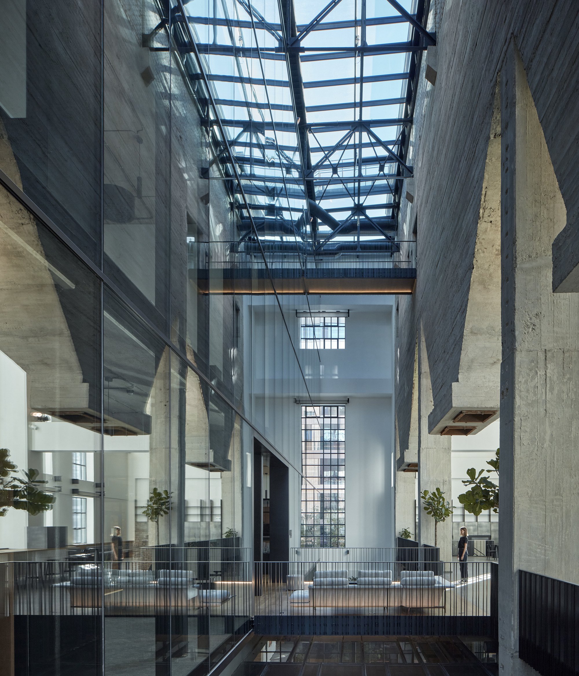 df creative group Nests a Five-Story Office Building Inside a WWII-Era Heating Plant in Bratislava