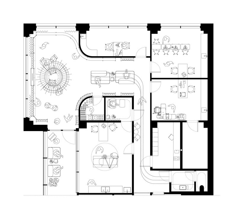 Floor plan drawing showing open workspace with central circular seating area and private meeting rooms