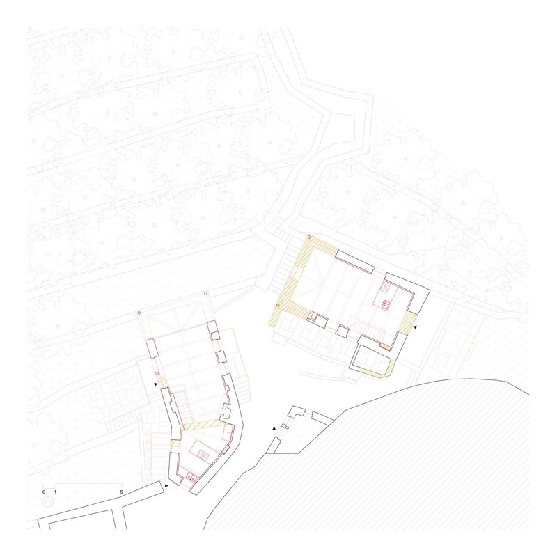 Site plan with highlighted building footprints and circulation zones in orange and yellow