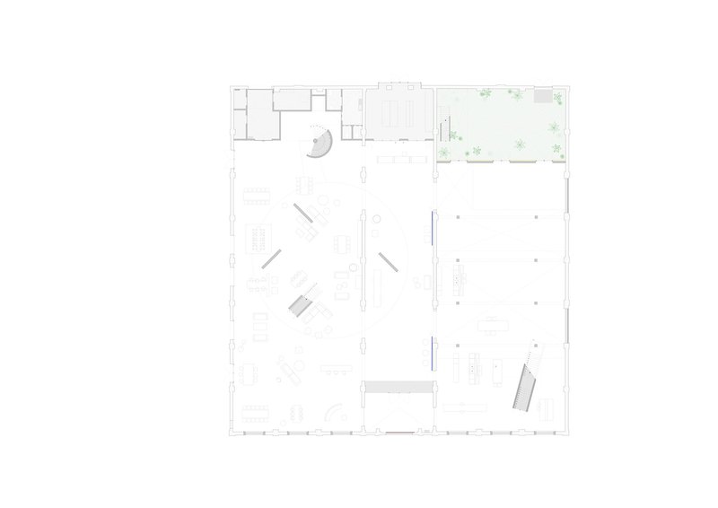 Floor plan drawing showing the open interior with diagonal partitions, courtyard, and perimeter column grid