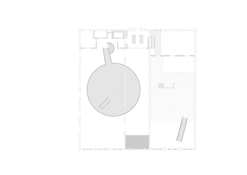 Floor plan drawing showing the circular gallery space and adjacent rectangular hall with regular column spacing
