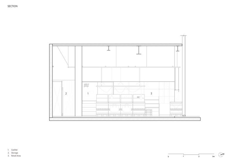 Section drawing showing interior elevation with storage wall and retail display shelving