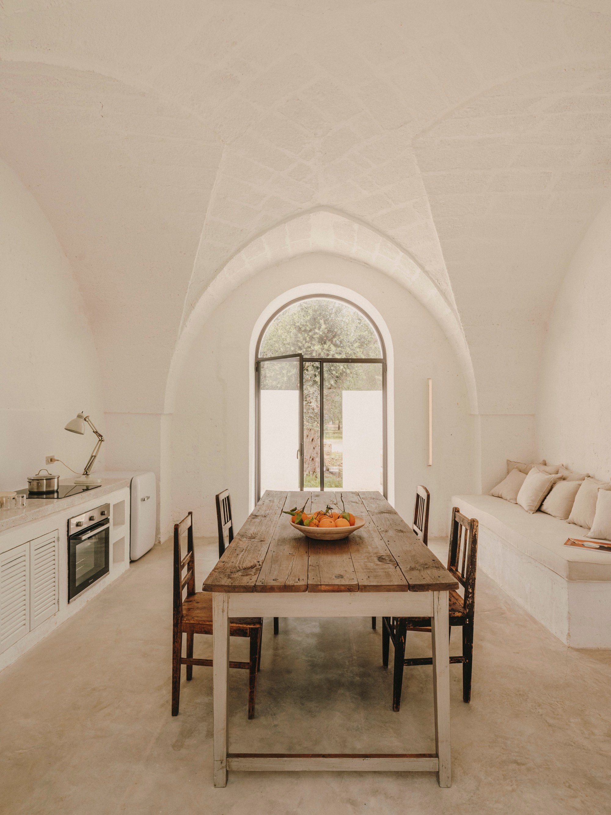 Studio Andrew Trotter Turns Two Pugliese Farm Buildings into a Three-House Retreat in the Olive Groves