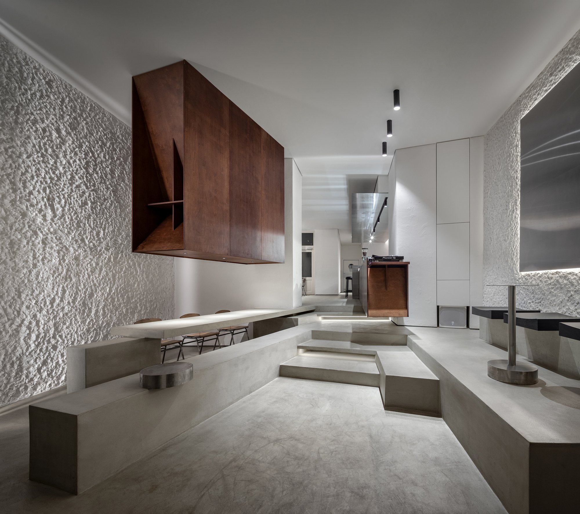 Ponomarenko Volodymyr Carves a Day-to-Night Café from Concrete Terraces in Central Warsaw