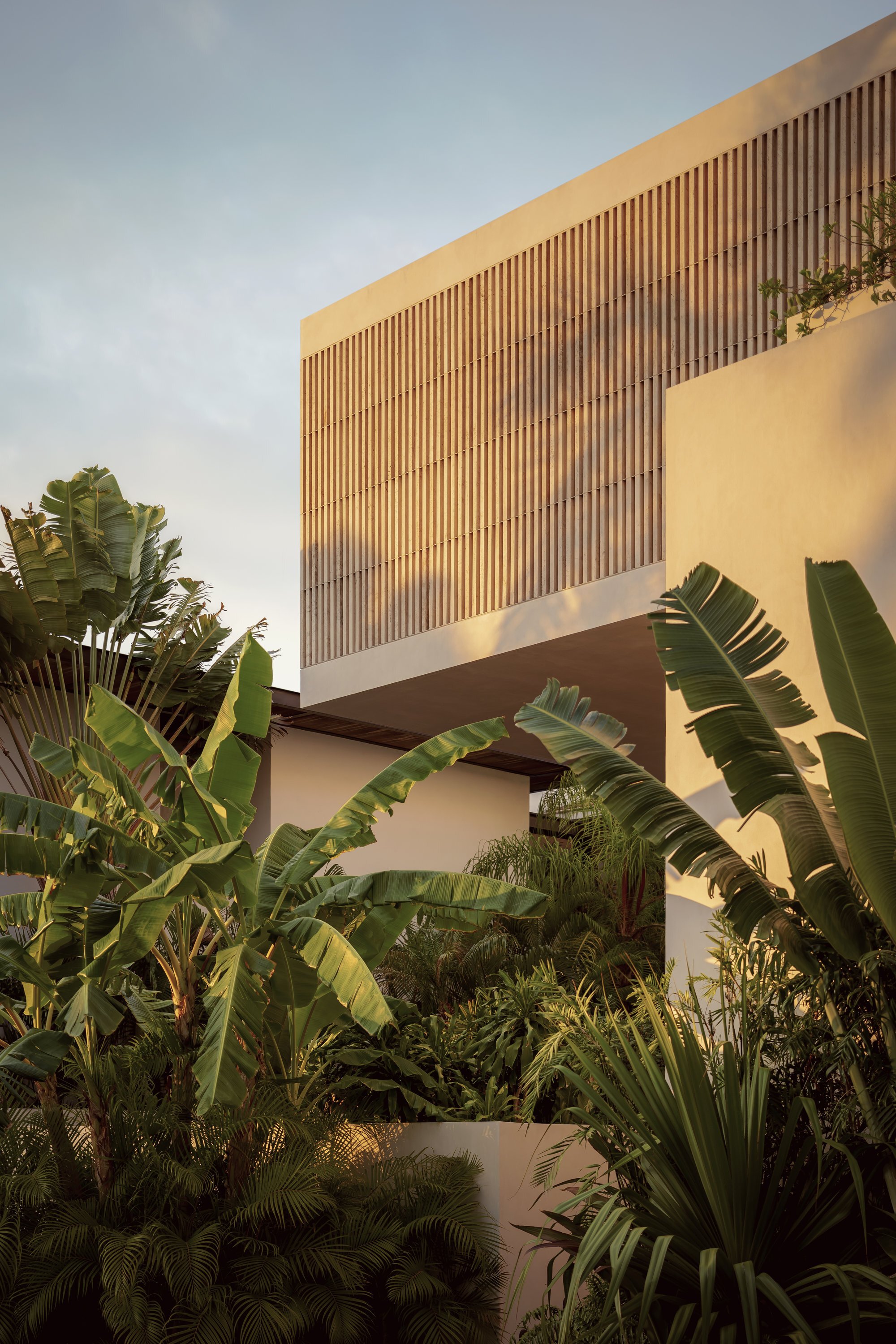 REIMS 502 Wraps a Cancún Family Home in Timber Screens and Interior Courtyards