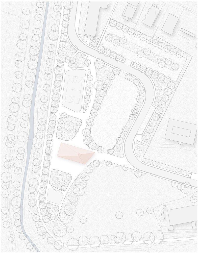 Site plan drawing showing curving pathways, tree-lined streets, and building footprints within a landscaped area