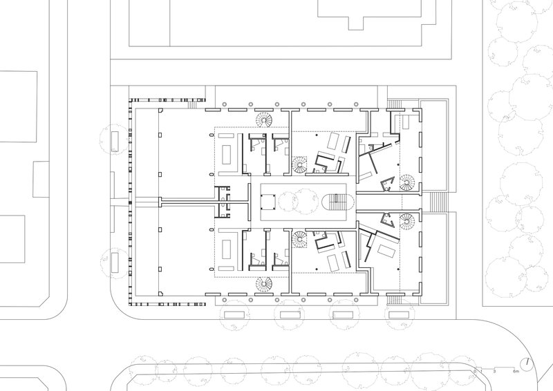 First floor plan drawing showing units with angled balconies and interior courtyards