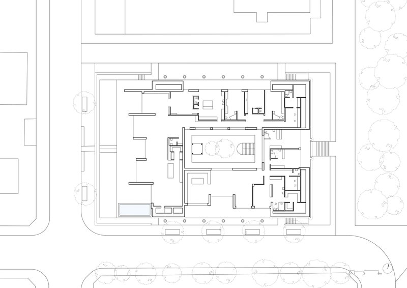 Third floor plan drawing showing recessed upper level units with perimeter circulation