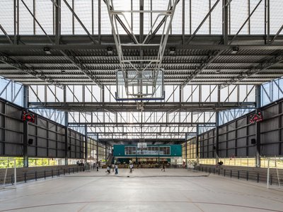 Estúdio Trópico Shelters a School Arena Under 2,100 Square Meters of Sawtooth Roof in São Paulo