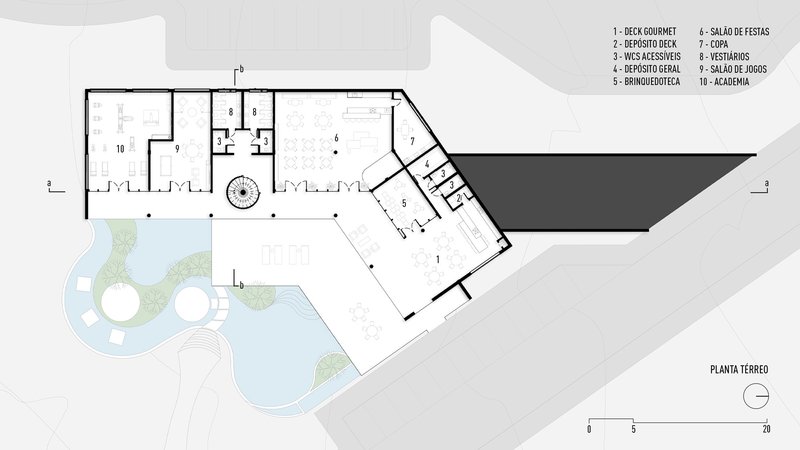 Ground floor plan drawing showing an angled wing with pool and landscaped courtyard