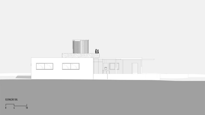 South elevation drawing showing a low horizontal volume with two water tanks on the roof