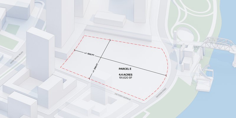 Site plan diagram showing the pentagonal parcel boundary adjacent to roadways and waterfront