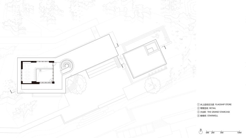 Site plan drawing showing a rectangular building with a circular element and adjacent structures surrounded by trees