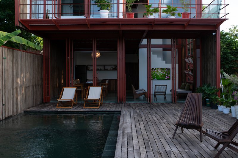 DUHA Architects Builds a Reversible Red Pavilion on Hue's Protected Perfume River Corridor