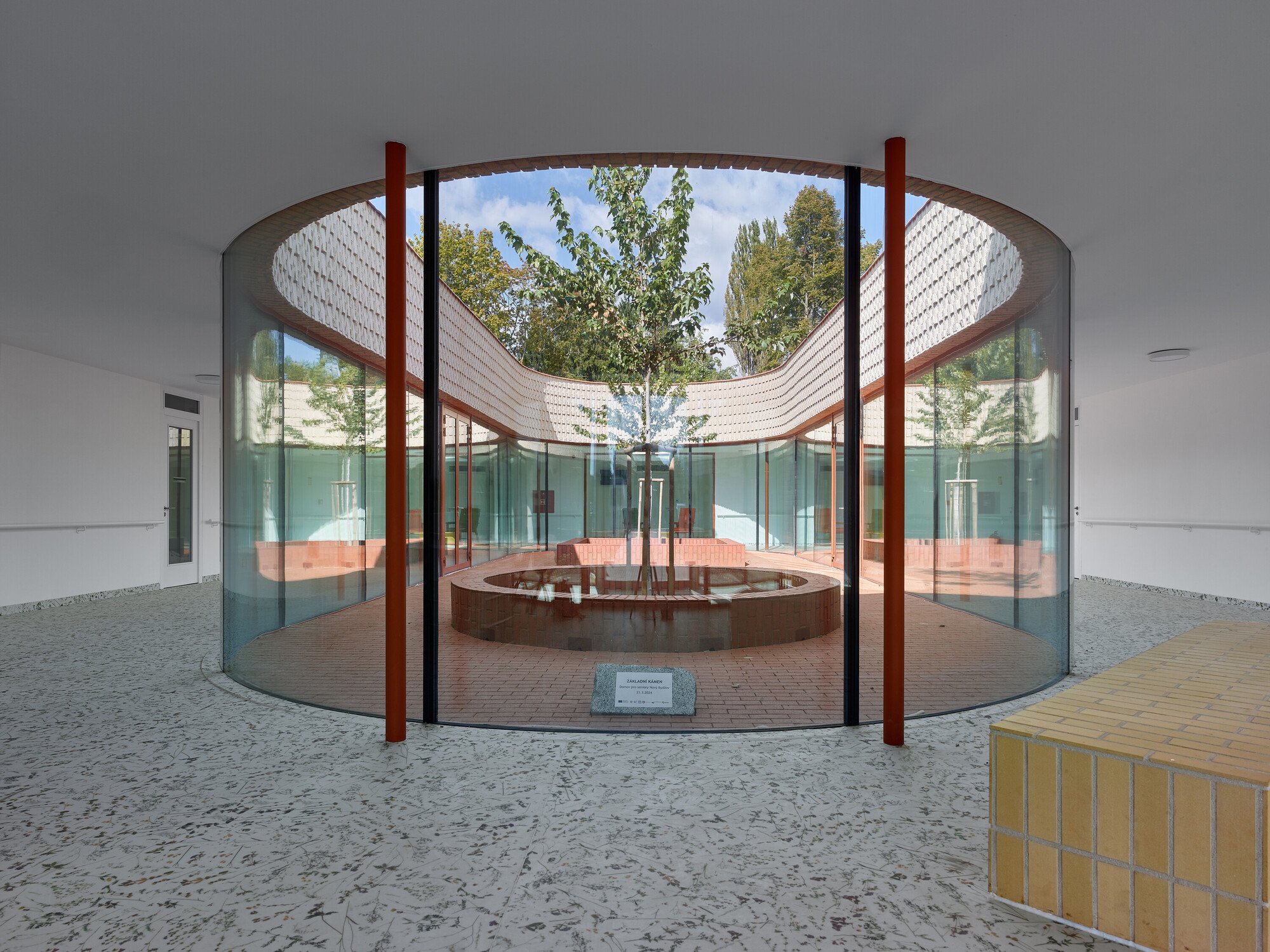 Architektura Arranges a Czech Retirement Home as Four Brick Households Around Planted Courtyards