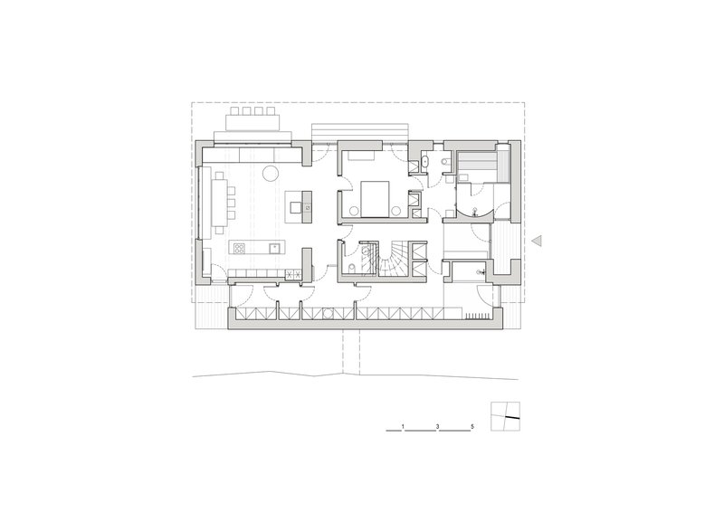 Ground floor plan drawing depicting an open-plan living space with bedrooms and bathrooms on the right