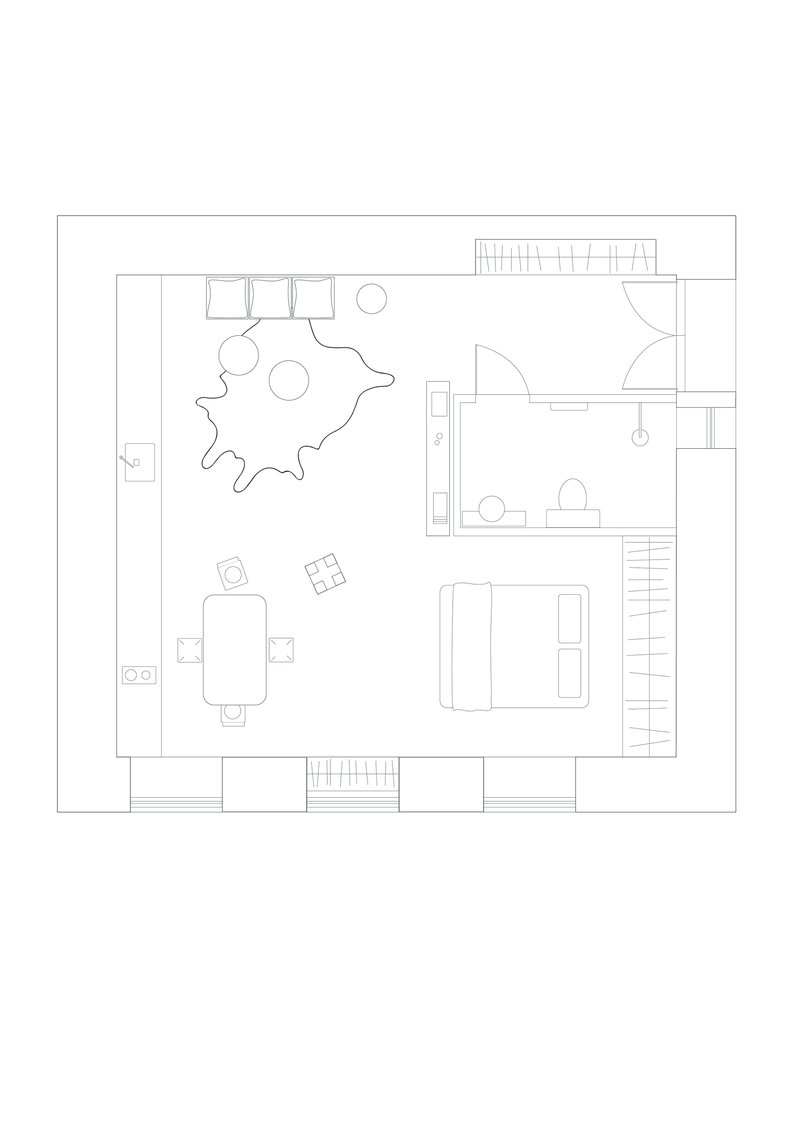 Floor plan drawing showing an open living space with kitchen, dining table and sculptural partition wall