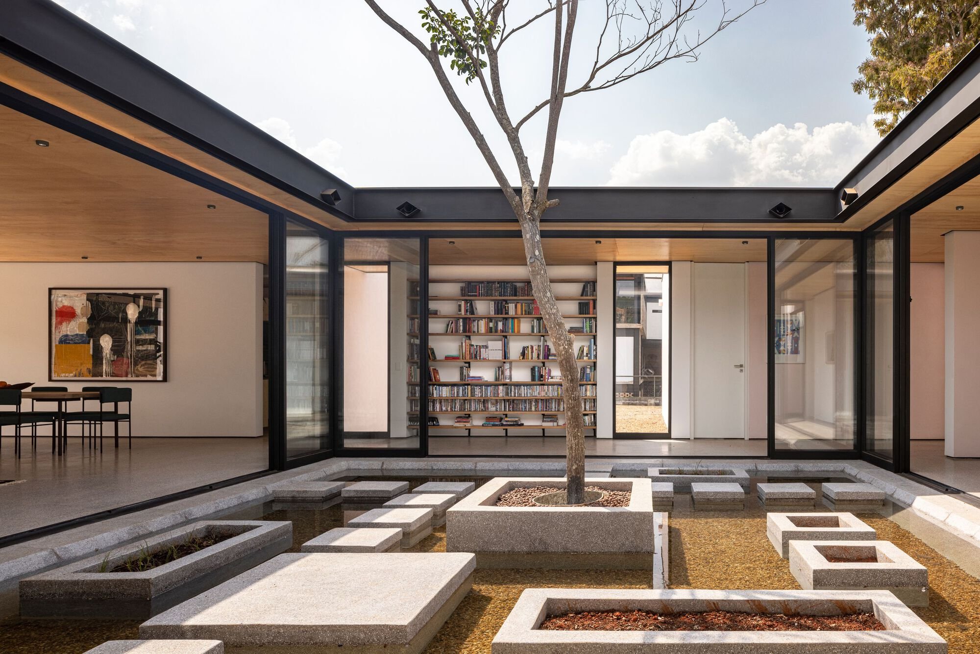 Equipe Lamas Rotates Four Pavilions Around a Rescued Ipê Tree in the Brazilian Cerrado