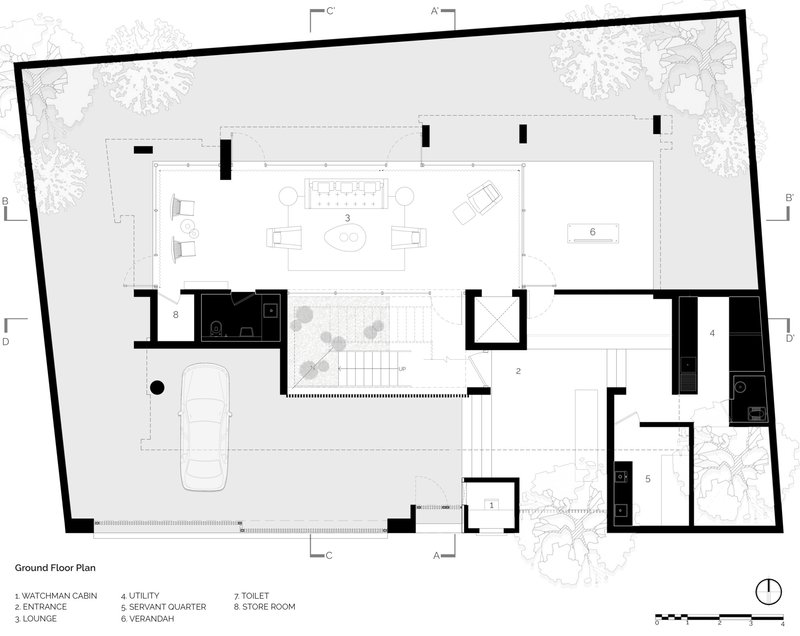 Ground floor plan drawing showing living spaces, bedrooms, and entry organized around central stair