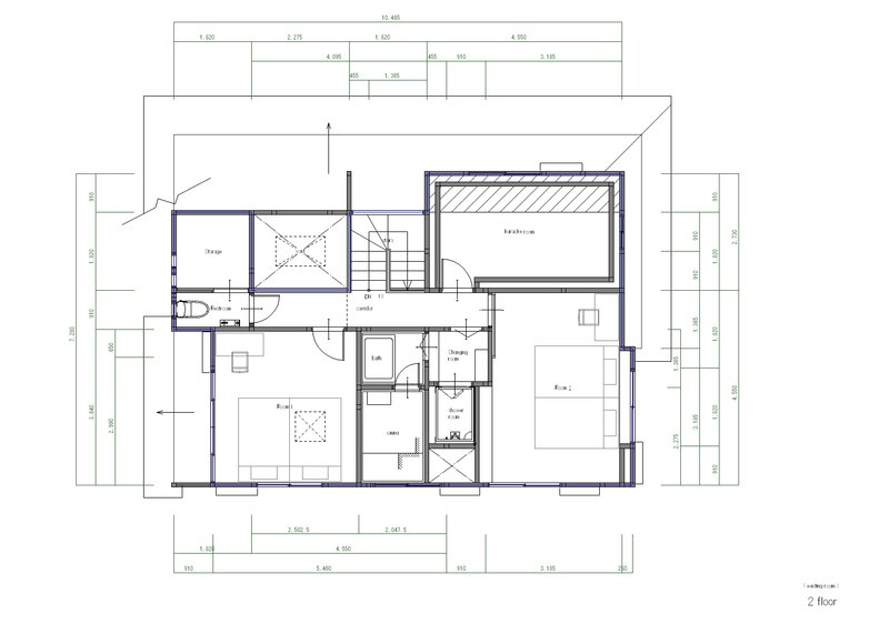 Second floor plan drawing with bedrooms, stairwell, and a lofted bedroom with angled ceiling