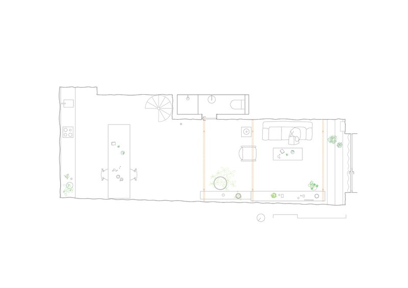 Floor plan drawing showing a narrow rectangular layout with kitchen, spiral stair, bathroom, and living area