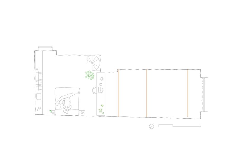 Floor plan drawing showing a staircase and spiral stair with furnished living spaces and planted courtyard