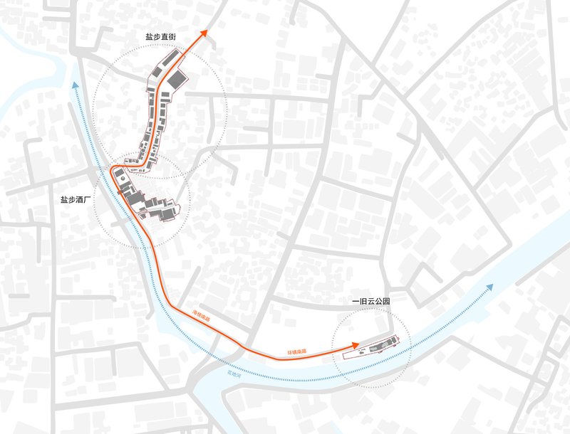 Site plan drawing showing building footprints along a curved pathway beside a river or waterway