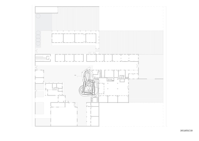 Floor plan drawing showing classroom wings arranged around a central courtyard with play elements