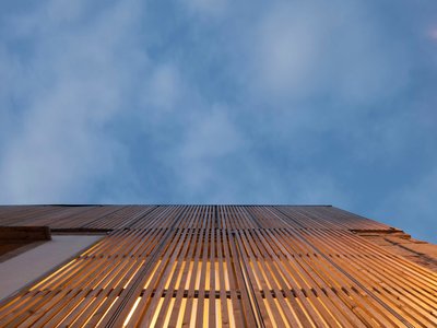 LIQE arquitectura Wraps a Vigo Old Town Housing Reform in Folding Pine Screens