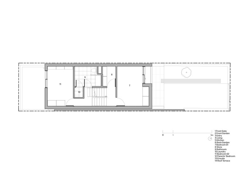 First floor plan showing bedroom, bathroom, and staircase in a narrow elongated layout