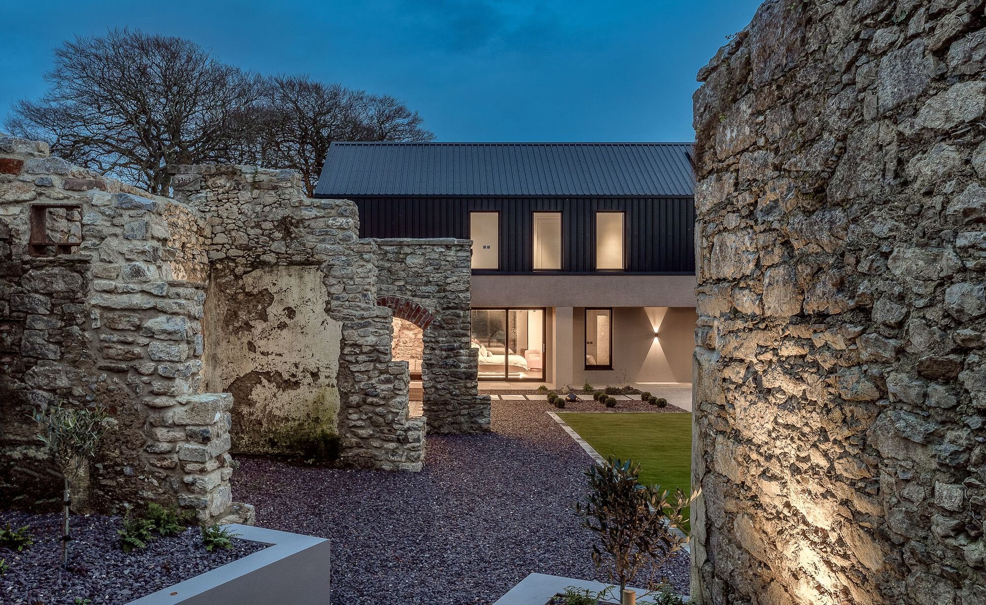 Steve Burke Builds His Parents a House That Treats Old Stone Ruins as the Main Event