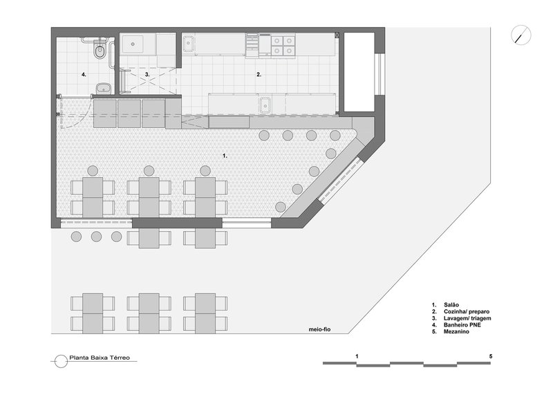 Ground floor plan drawing showing dining area with tables, kitchen, bathroom and outdoor seating arrangement