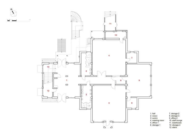 Floor plan drawing showing rooms arranged around a central hall with curved stair and labeled storage areas