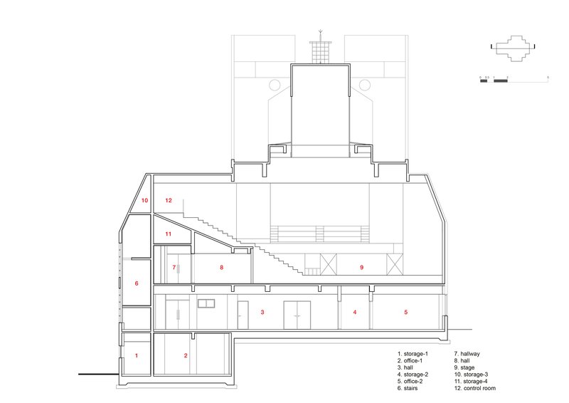 Section drawing cutting through multiple levels with a diagonal staircase and a rooftop tower element