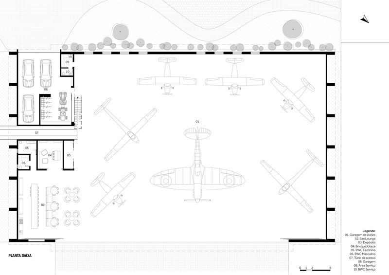 Ground floor plan showing aircraft parking positions with support rooms and landscaping along the edge