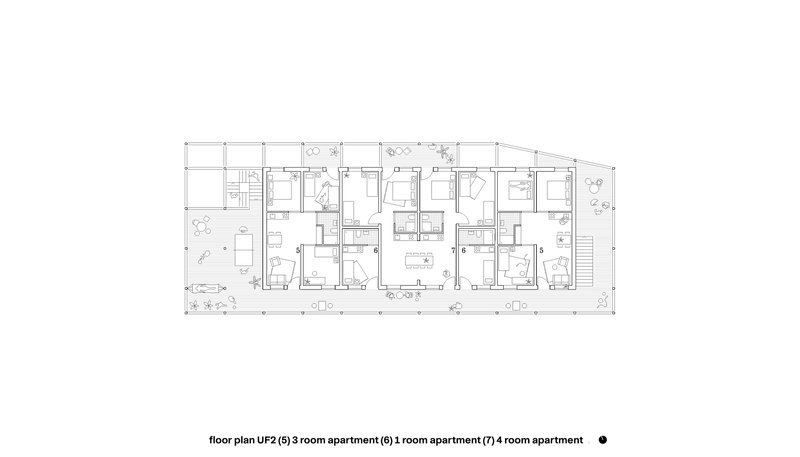 Floor plan drawing showing three residential units with rooms and balconies along a corridor