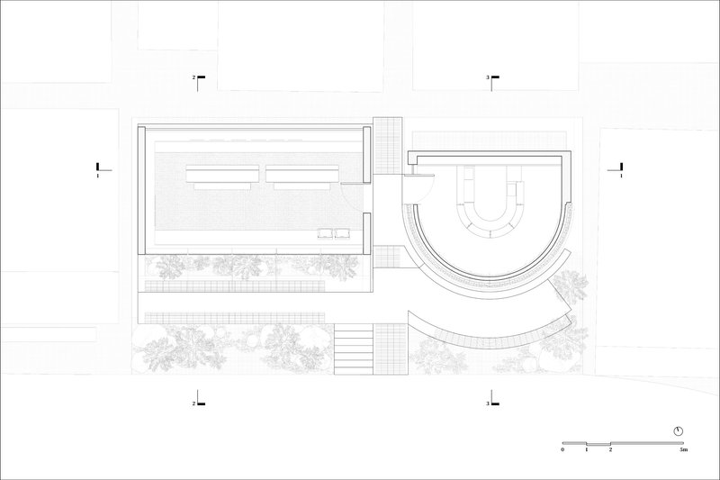 Plan drawing showing rectangular and curved volumes connected by planted courtyards and stepped entry