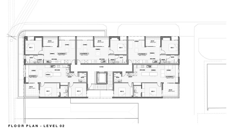Level 02 floor plan drawing showing multiple apartments with bedrooms, living areas and bathrooms symmetrically arranged