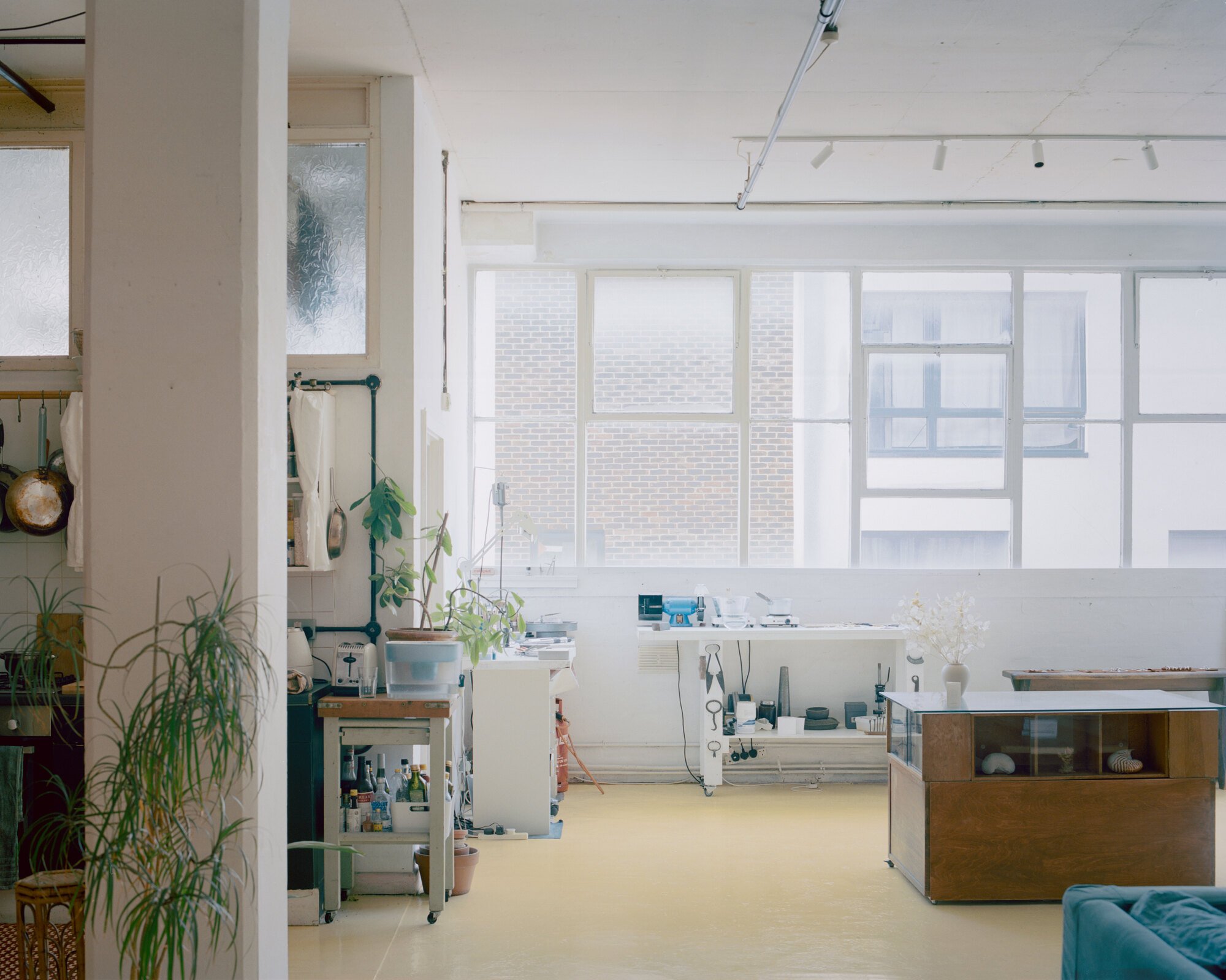 Studio Mutt Converts a Hackney Wick Industrial Unit into a Live-Work Space Shaped by Curtains and Resin