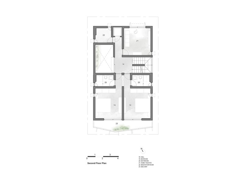Second floor plan drawing showing bedroom layout, bathrooms, and stair core with front balcony